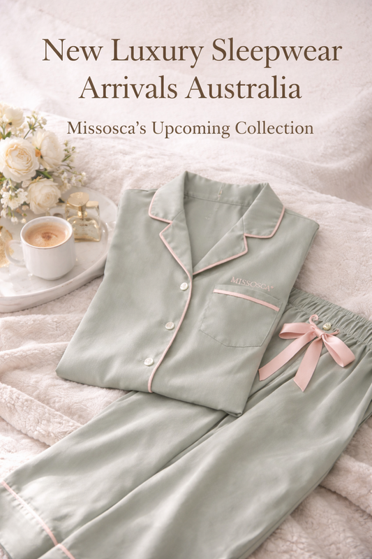 Luxury sleepwear set in sage green with pink trim displayed on a soft bed, representing Missosca’s new luxury sleepwear collection in Australia