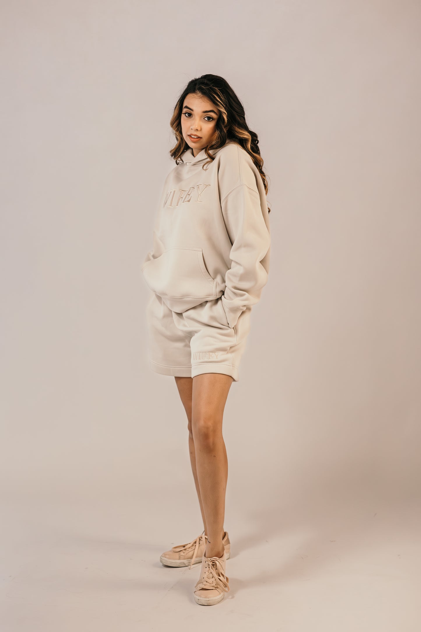 Bride wearing wifey shorts relaxed fit bridal loungewear outfit