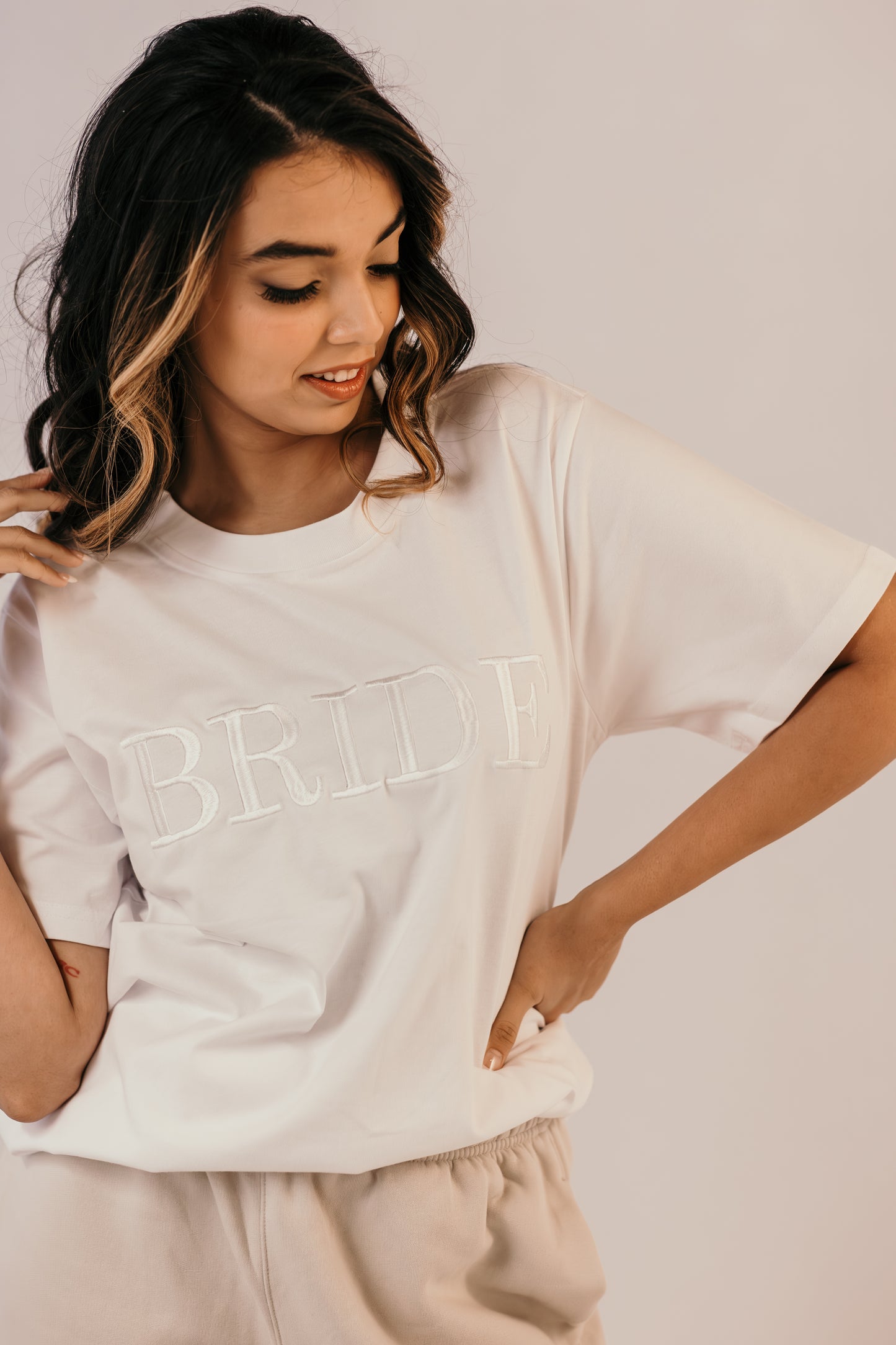 Bride wearing white bridal tee relaxed fit minimalist style