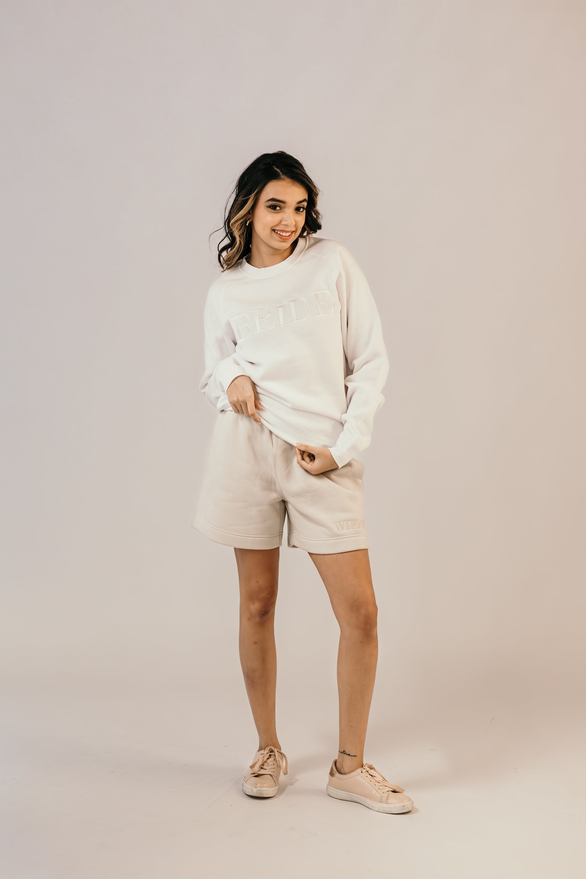 Bride wearing white crew sweater bridal loungewear Missosca Australia