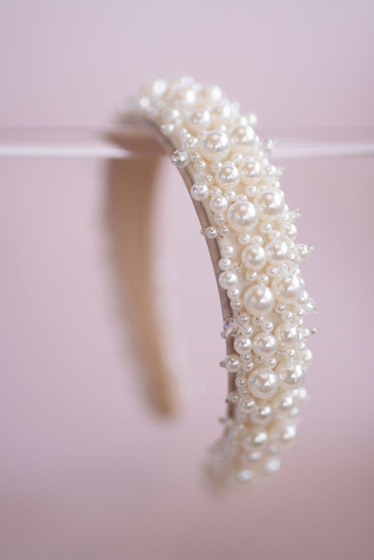 Pearl bridal headband with clustered faux pearls on soft padded band for elegant wedding hairstyles