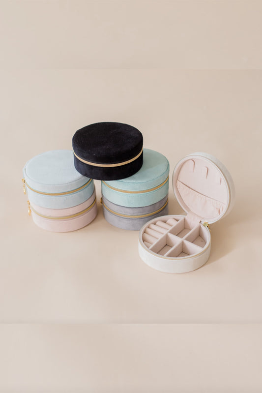 Round velvet jewellery box organiser with zip closure in multiple pastel colours