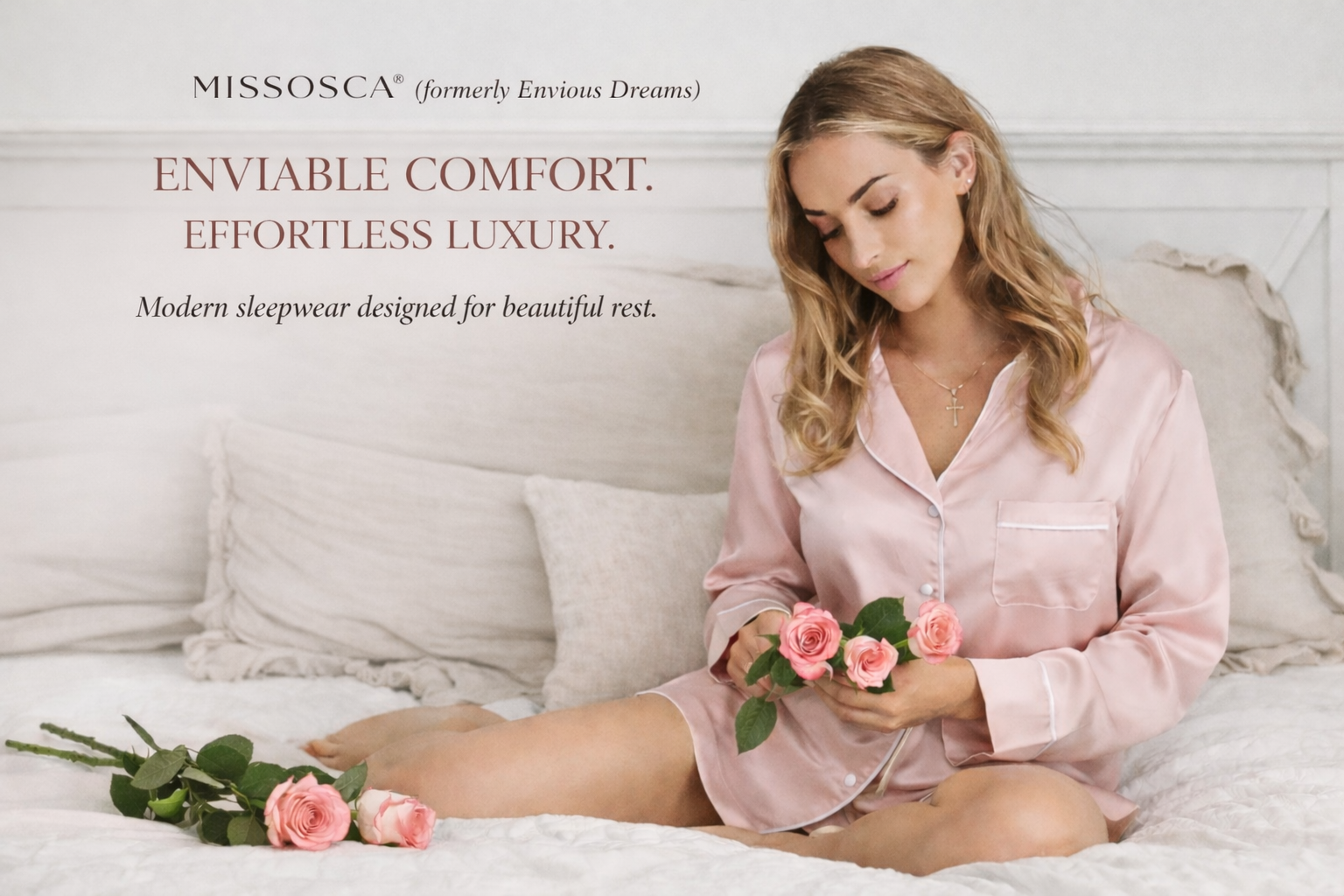 MISSOSCA® luxury women’s sleepwear Australia, formerly Envious Dreams, blush satin pyjamas styled on bed with roses.