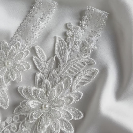Bridal lace garter set showcasing elegant fit and refined wedding accessory design.