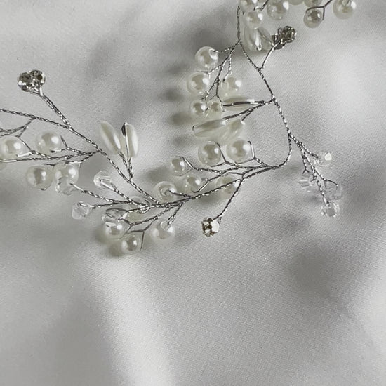 Silver bridal hair vine showcasing flexible design and elegant wedding styling.