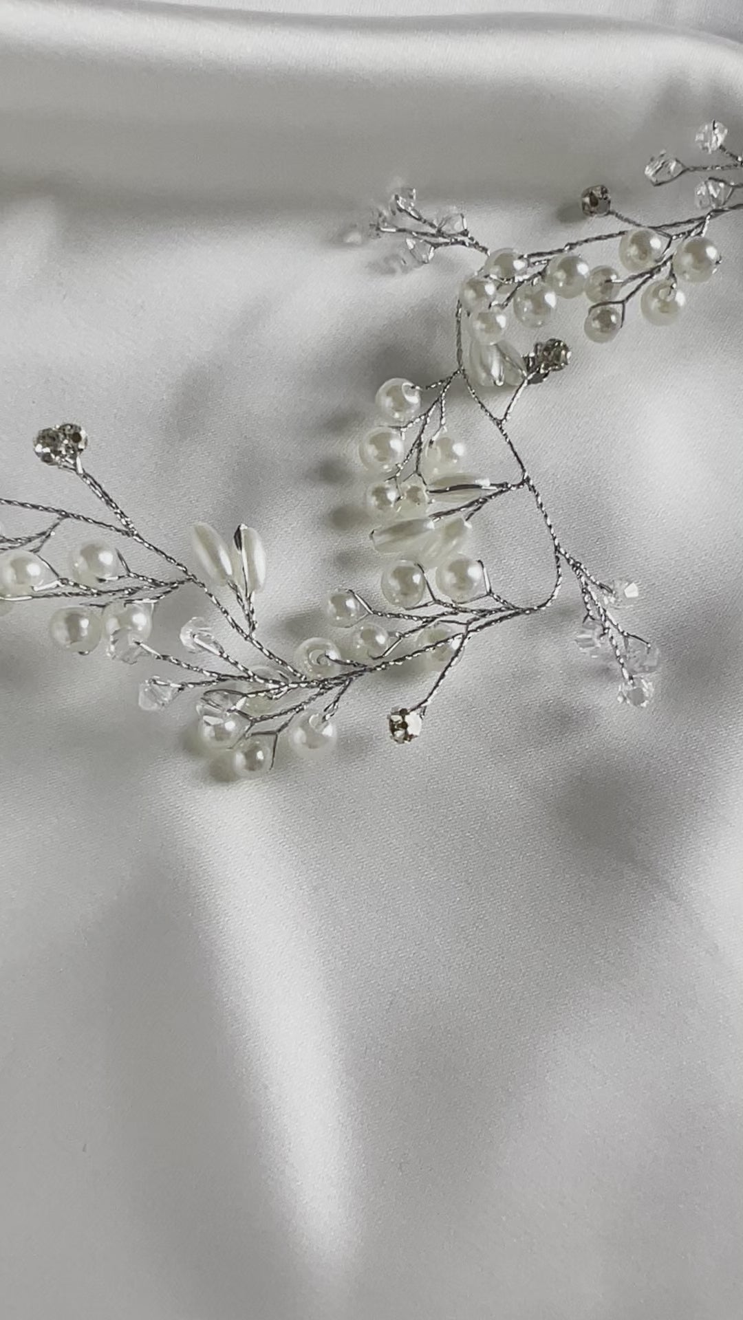 Silver bridal hair vine showcasing flexible design and elegant wedding styling.