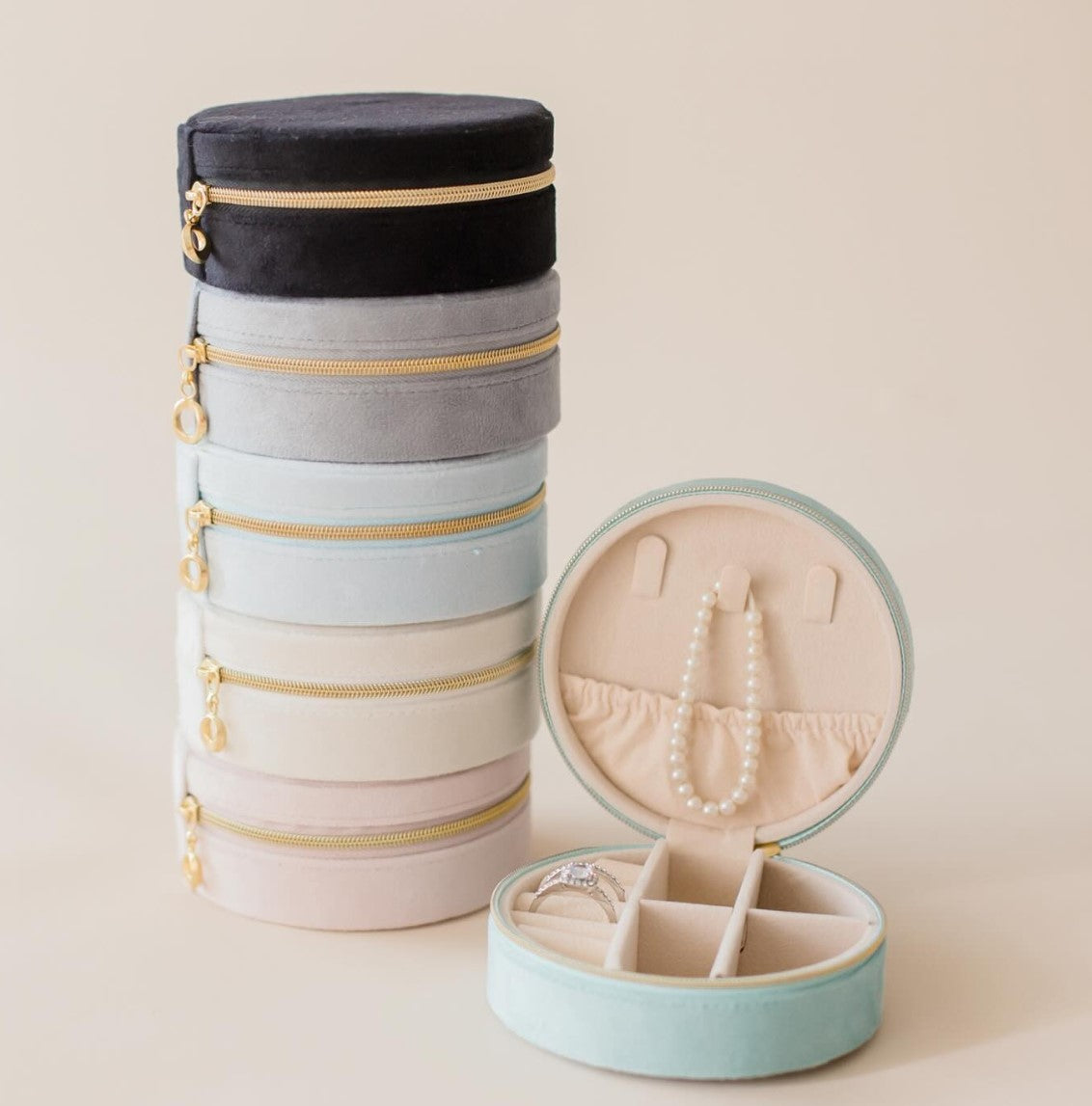 Stacked round velvet jewellery organisers in assorted colours elegant storage case